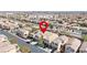 A beautiful aerial view of a suburban house with solar panels on the roof at 9034 Grenache St at 9034 Grenache St, Las Vegas, NV 89148