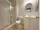 Bathroom featuring a vanity with storage, a modern sink and faucet, and a glass-enclosed shower at 9034 Grenache St, Las Vegas, NV 89148