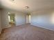 Large carpeted room with connected bathroom and bedroom, great flow and natural light at 9034 Grenache St, Las Vegas, NV 89148