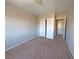 A bedroom featuring a closet with white doors and neutral color scheme at 9034 Grenache St, Las Vegas, NV 89148