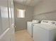 Functional laundry room featuring a side-by-side washer and dryer at 9034 Grenache St, Las Vegas, NV 89148