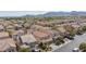 Aerial view of a residential neighborhood with mountains in the background at 9039 Alex Creek Ave, Las Vegas, NV 89149