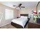 Comfortable bedroom featuring neutral tones and a ceiling fan for added comfort at 9039 Alex Creek Ave, Las Vegas, NV 89149