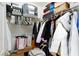 Walk-in closet with clothing, boxes, and storage containers, maximizing space for organization and storage at 9039 Alex Creek Ave, Las Vegas, NV 89149