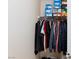 Organized walk-in closet with shelving and hanging space, providing ample storage for clothing and accessories at 9039 Alex Creek Ave, Las Vegas, NV 89149