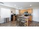 Stylish kitchen with stainless appliances, granite counters and a center island at 9039 Alex Creek Ave, Las Vegas, NV 89149