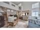Spacious living room featuring high ceilings, tile flooring, and natural light at 9348 Buckhaven Dr, Las Vegas, NV 89117