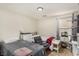 Comfortable bedroom with two beds, soft carpeting, and natural light from the window, offering a cozy atmosphere at 9690 Langden Brook St, Las Vegas, NV 89178