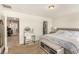 Cozy main bedroom with comfortable furnishings and neutral color scheme at 9690 Langden Brook St, Las Vegas, NV 89178