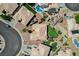 Top-down view of neighborhood streets, roof tops, backyard pools, and desert-style yards at 983 Cutter St, Henderson, NV 89011