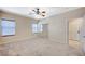 Bedroom featuring carpet floors, ceiling fan, and a closet at 983 Cutter St, Henderson, NV 89011