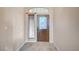 Traditional entryway with tile floors and decorative glass door at 983 Cutter St, Henderson, NV 89011