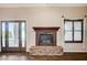 Cozy living room with fireplace and outdoor access at 983 Cutter St, Henderson, NV 89011