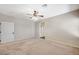 Spacious main bedroom features a ceiling fan and ensuite bathroom entrance at 983 Cutter St, Henderson, NV 89011
