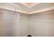 Walk-in closet featuring white-painted wood trim and shelving at 983 Cutter St, Henderson, NV 89011