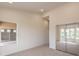 This bedroom features carpet and a mirrored closet at 10421 Linfield Pl, Las Vegas, NV 89134