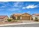 Charming single-story home with a two-car garage and desert landscaping at 10421 Linfield Pl, Las Vegas, NV 89134