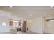 Open living room with stainless steel appliances and lots of natural light coming through the entryway at 10421 Linfield Pl, Las Vegas, NV 89134
