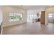Spacious living room boasts lots of natural light and an open floor plan for entertaining at 10421 Linfield Pl, Las Vegas, NV 89134