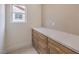 This office nook features custom cabinets and a countertop desk at 10421 Linfield Pl, Las Vegas, NV 89134