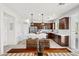 Charming kitchen features a large island, stainless steel appliances, and a pantry at 10474 Palmadora St, Las Vegas, NV 89178