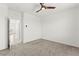 Clean and neutral bedroom features modern ceiling fan and doorway to hallway at 1103 Tektite Ave, Henderson, NV 89011