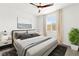 Comfortable bedroom with a modern bed, soft lighting, and a window view at 1103 Tektite Ave, Henderson, NV 89011