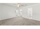 Spacious bedroom boasts neutral carpet, ensuite bathroom access, and walk-in closet at 1103 Tektite Ave, Henderson, NV 89011