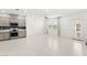 Open concept living space with a modern kitchen and natural light at 1103 Tektite Ave, Henderson, NV 89011