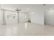 Open living space with tile floors and a staircase at 1103 Tektite Ave, Henderson, NV 89011