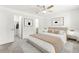 Serene primary bedroom retreat featuring neutral decor, plush carpeting, and ample natural light at 1103 Tektite Ave, Henderson, NV 89011
