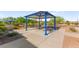 A picnic area with a gazebo and picnic tables surrounded by landscaping at 1103 Tektite Ave, Henderson, NV 89011