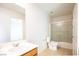 Bathroom with tub, shower, toilet, and vanity providing a full suite of amenities at 11044 Camden Bay St, Las Vegas, NV 89179