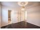 Bedroom with wood floors, natural lighting from a window, and access to other rooms at 11044 Camden Bay St, Las Vegas, NV 89179