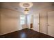 Bedroom with wood floors, natural lighting from a window, and a closet door, great for relaxation at 11044 Camden Bay St, Las Vegas, NV 89179