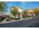 Beautiful home with desert landscaping and a charming arched entryway at 11044 Camden Bay St, Las Vegas, NV 89179
