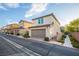 Charming home with a two-car garage, well-maintained landscaping, and an inviting curb appeal at 11044 Camden Bay St, Las Vegas, NV 89179