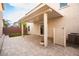 Spacious covered patio with brick pavers and artificial turf at 11044 Camden Bay St, Las Vegas, NV 89179