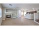 Open concept living room with a fireplace and tile flooring at 1554 Ward Frontier Ln, Henderson, NV 89002