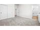 Bedroom with carpet, window with plantation shutters and access to bathroom at 2164 Noonday Ct, Henderson, NV 89052