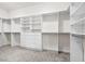 A spacious walk-in closet features custom shelving and drawers at 2164 Noonday Ct, Henderson, NV 89052