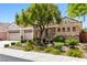 Charming single-story home featuring a three-car garage and stone accents at 2164 Noonday Ct, Henderson, NV 89052