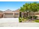 Charming single-story home featuring a three-car garage and stone accents at 2164 Noonday Ct, Henderson, NV 89052