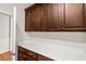 A kitchen pantry area features wood cabinets and a white countertop at 2164 Noonday Ct, Henderson, NV 89052