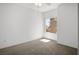 Bright, carpeted bedroom featuring ceiling fan and natural light from window at 2315 Sun Cliffs St, Las Vegas, NV 89134