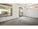 Spacious empty room with sliding glass doors leading to backyard at 2315 Sun Cliffs St, Las Vegas, NV 89134