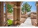 Inviting front entrance with stone pillars, a tiled porch, and a view of the landscaped yard at 2315 Sun Cliffs St, Las Vegas, NV 89134