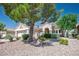 Attractive single-story home with mature trees, tasteful landscaping, and a welcoming front entrance at 2315 Sun Cliffs St, Las Vegas, NV 89134