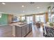 Open-concept living space featuring a modern kitchen, dining area, and spacious living room at 2646 Begonia Falls Ave # 41, North Las Vegas, NV 89081