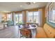 Open-concept living space with natural light, dining area, and comfortable seating at 2646 Begonia Falls Ave # 41, North Las Vegas, NV 89081